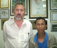 Counselor for Economic Affairs Larry L. Memmott (left) of the Embassy of the United States of America with Jonavin V. Villalba of Aksyon Radyo Iloilo.