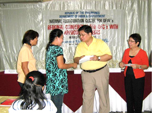 Secretary Arturo Brion turns over the project.
