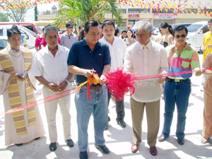 The cutting of ribbon