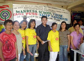 Atty. Jobert Peñaflorida (5th from left), ABS-CBN host and Executive Director of Taos Puso Foundation Inc. with the TPFI staff.