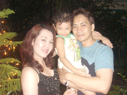 With husband Edwin and daughter Francine Viktoria.