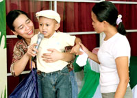 RK Diopeta and his mom with KKK