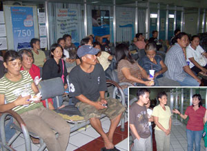 Family members of passengers of Superferry 9 wait for developments at the Iloilo Port Terminal yesterday afternoon.