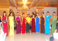The celebrator and the models wearing Mel Varca's gowns.